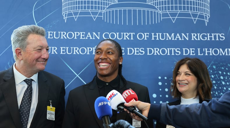 FILE - South Africa athlete Caster Semenya, center, answers reporters with lawyers Gregory Nott, left, and Shona Jolly KC after Semenya won a partial victory at the European Court of Human Rights on in her seven-year legal fight against track and field's sex eligibility rules, Thursday, July 10, 2025 in Strasbourg, eastern France. (AP Photo/Antonin Utz, File)