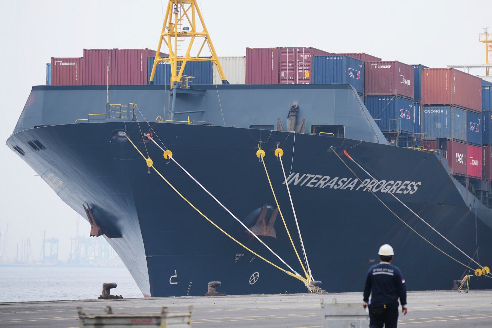 FILE - Shipping containers are stacked on a cargo ship docked at Jakarta International Container Terminal (JICT) at Tanjung Prior Port in Jakarta, Indonesia, April 11, 2025.(AP Photo/Tatan Syuflana, File)