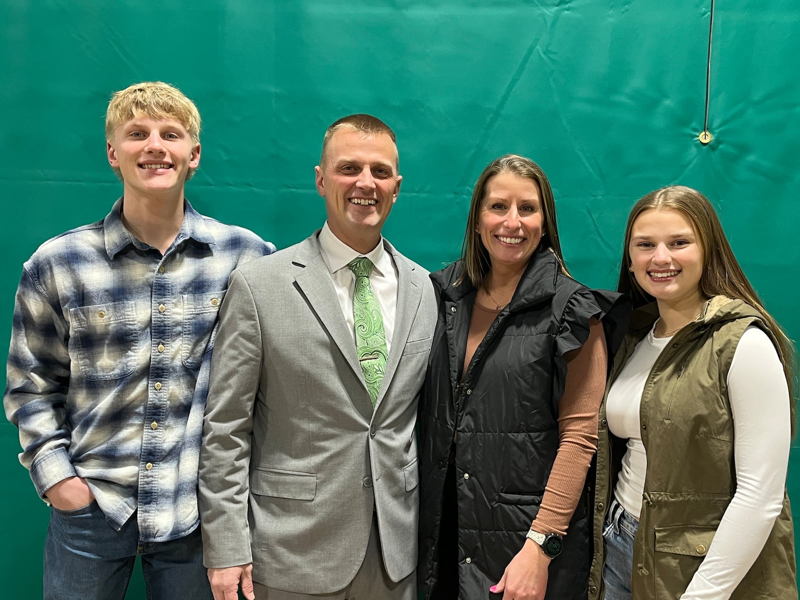 Eric Hughes with his family, including Garrison Hughes, left, Ava Hughes, right, and wife Aubrey Hughes. CONTRIBUTED