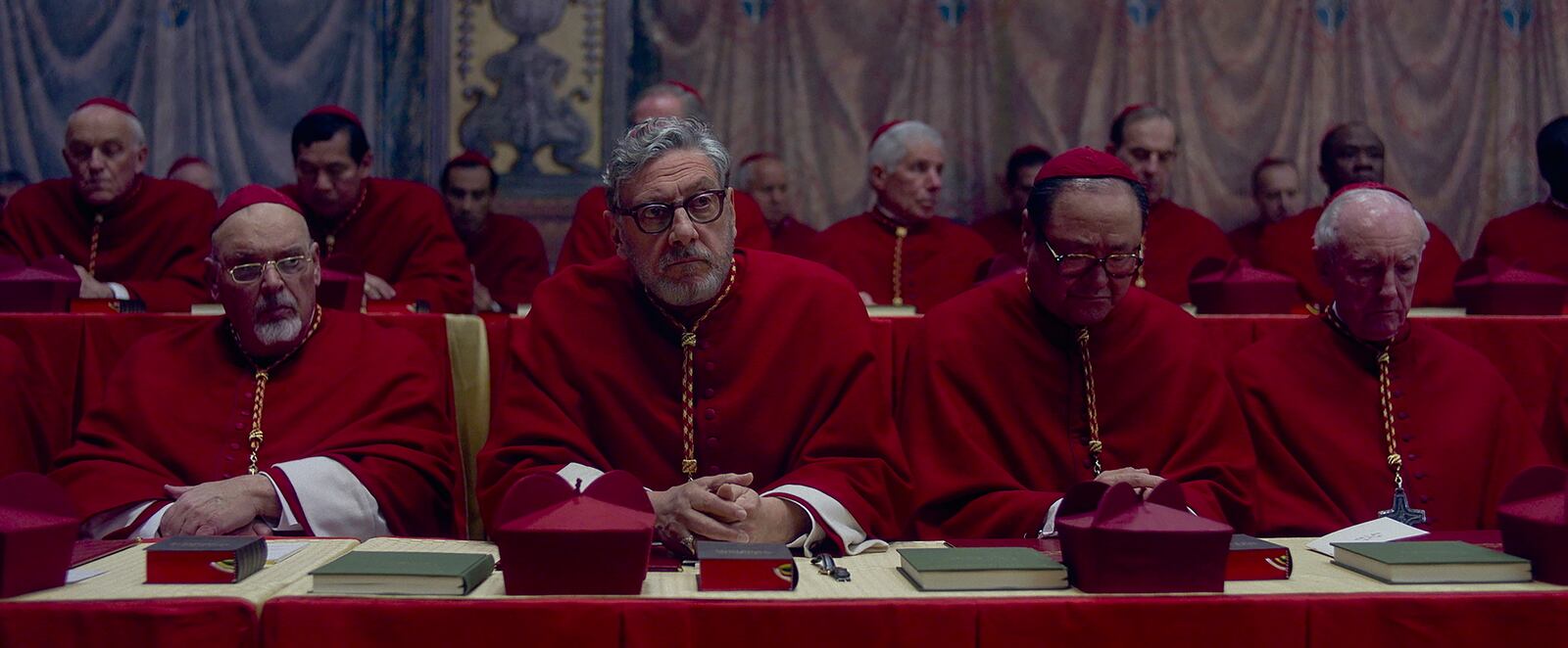 This image released by Focus Features shows Sergio Castellitto, center, in a scene from "Conclave." (Focus Features via AP)