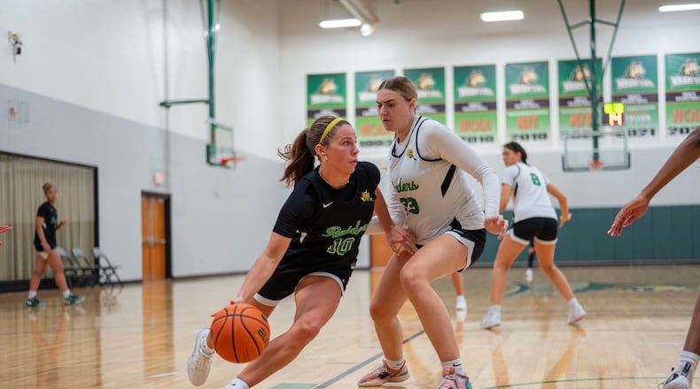Wright State's Macie Taylor (10) drives against teammate Elle Bruschuk during a recent practice. WSU Athletics photo