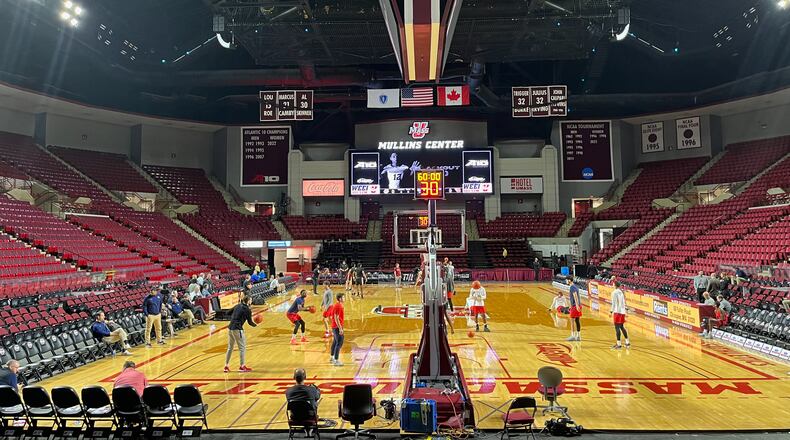 Dayton warms up before a game against Massachusetts on Wednesday, Feb. 22, 2023, at the Mullins Center in Amherst, Mass. David Jablonski/Staff