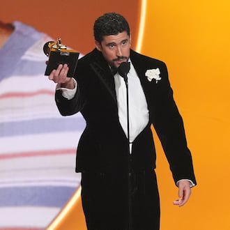 Bad Bunny accepts the award for album of the year for "Debí Tirar Más Fotos" during the 68th annual Grammy Awards on Sunday, Feb. 1, 2026, in Los Angeles. (AP Photo/Chris Pizzello)
