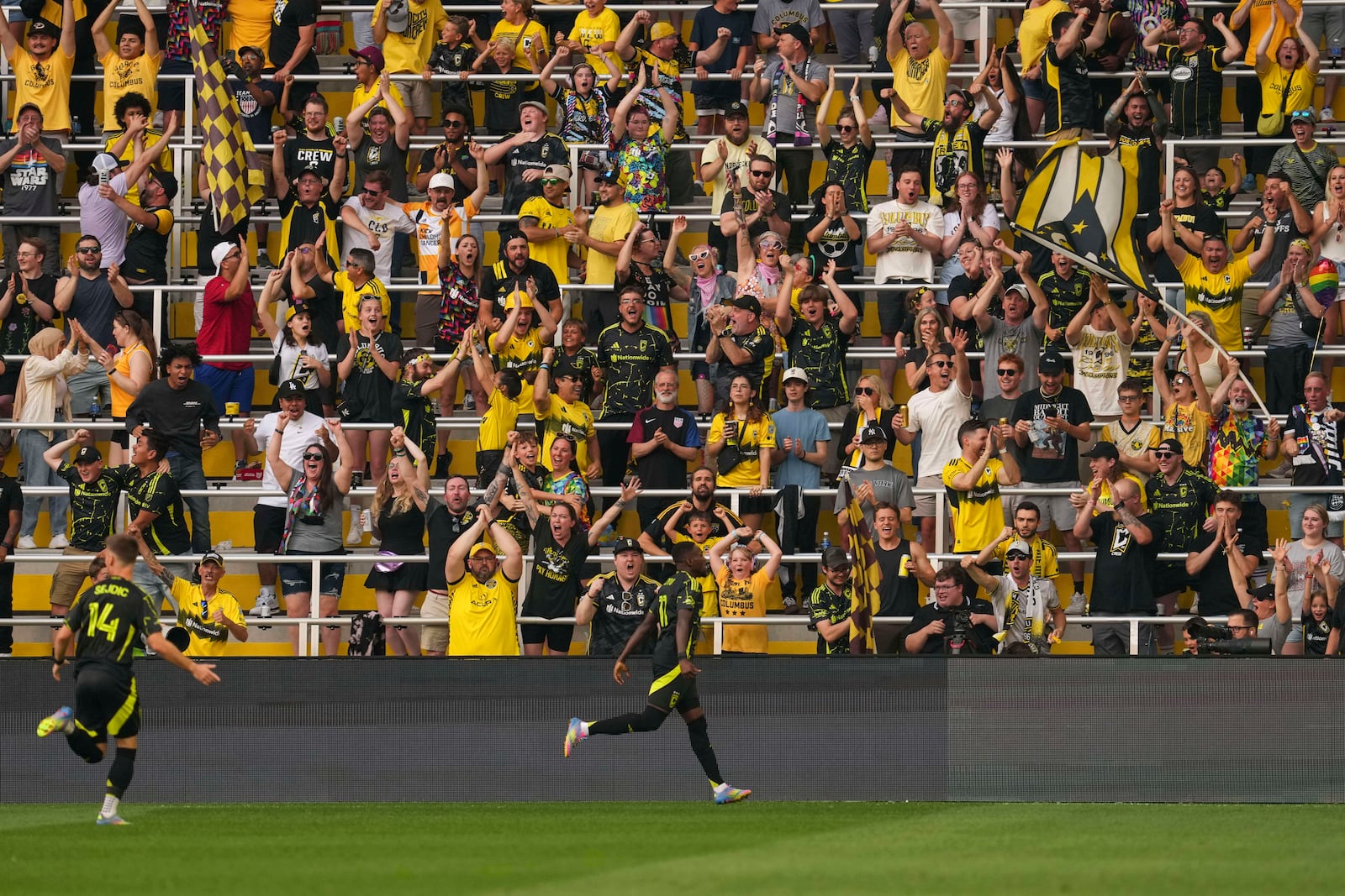 Columbus Crew forward Ibrahim Aliyu (11) reacts after scoring during the first half of an MLS soccer match against the Vancouver Whitecaps, Saturday, June 14, 2025, in Columbus, Ohio. (AP Photo/Jeff Dean)