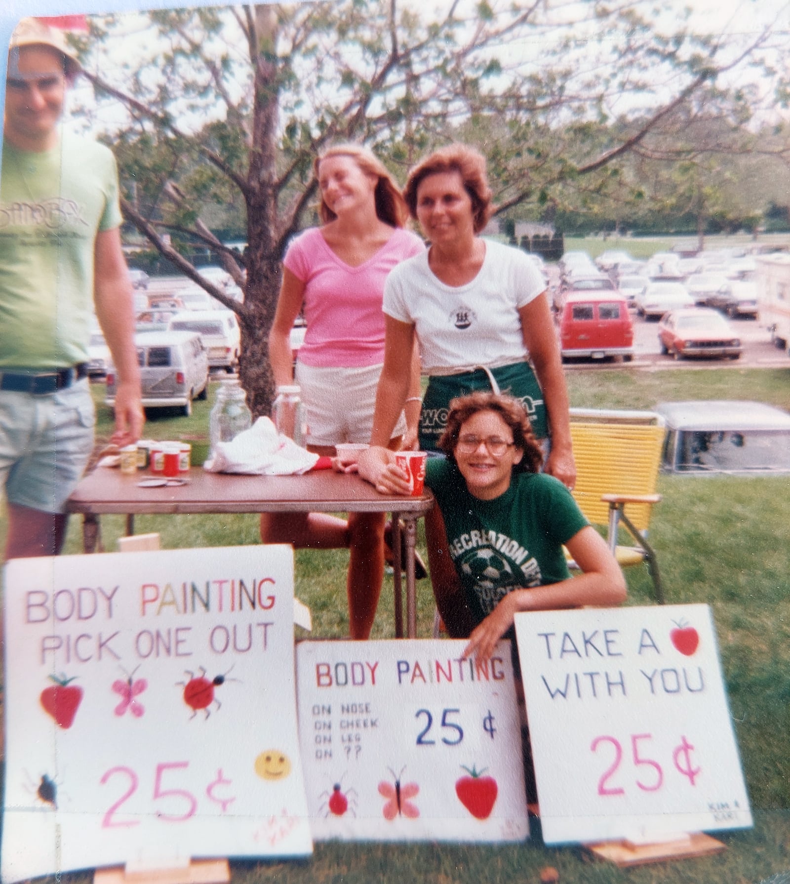 L-R Doug Spraul, Kim (Spraul) Bramlage, Gerry Spraul, Kari (Spraul) Dillman at the Troy Strawberry Festival in the early 1980's. The family has made this an annual tradition for 47 years.