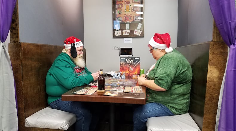 Dayton board game cafe Cardboard Crowns, wants to be the go-to spot for family and friends to gather around the table for some holiday gaming. Contributed photo