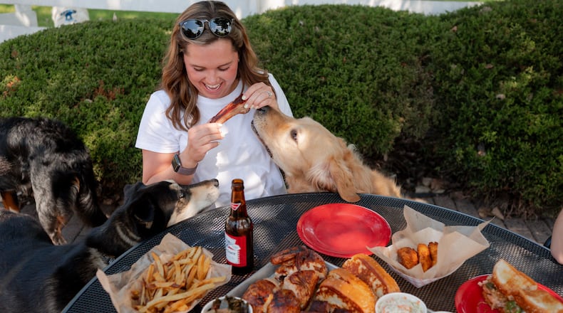 City Barbeque locations in the Dayton area are celebrating the “Dog Days of Summer” with weekly offers for City Rewards members, opportunities to support local humane societies and an invitation to bring your pup to the brand’s dog-friendly patios. CONTRIBUTED PHOTO.