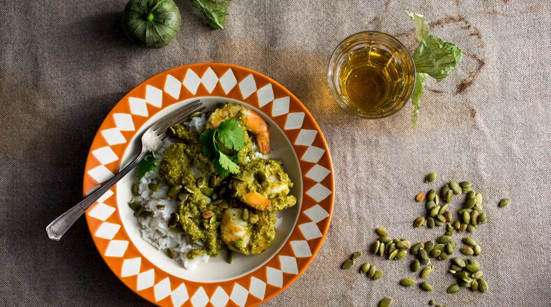 Shrimp with green mole in New York, Jan. 2, 2016. For all the nuance of mole, there are only three basic steps to making it: Whip up that puree in a blender; sear the puree in oil and cook it until it thickens slightly; then add chicken stock and simmer until the mixture is creamy.