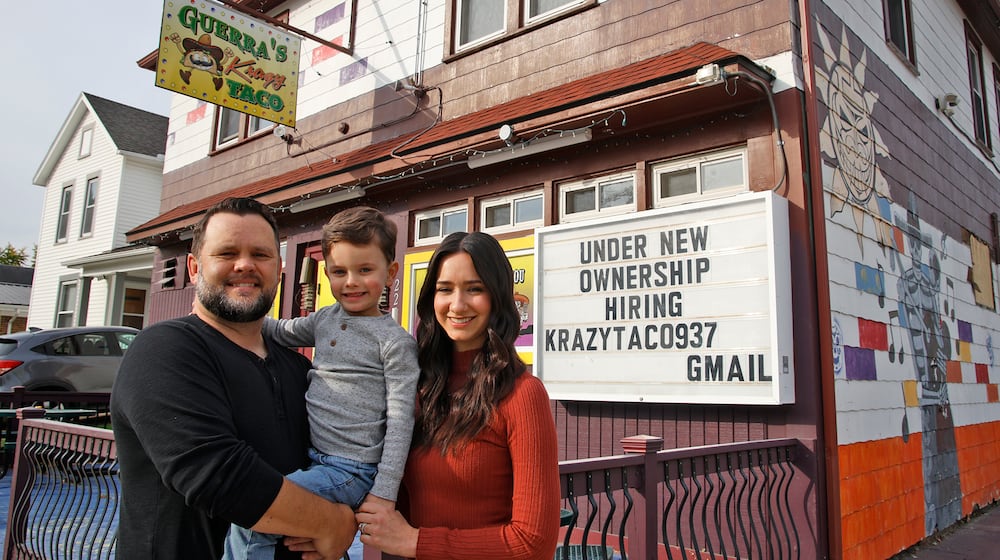 Steve Levitt, his wife, Crissy, and son, Ian, when the couple became the new owners of Krazy Taco 937, formerly Guerra's Krazy Taco, Thursday, Oct. 19, 2023. BILL LACKEY/STAFF