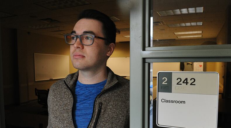 With the teacher shortage Wright State University teaching student Brandon Young will be going from his college classroom right into a teaching classroom.  MARSHALL GORBY\STAFF