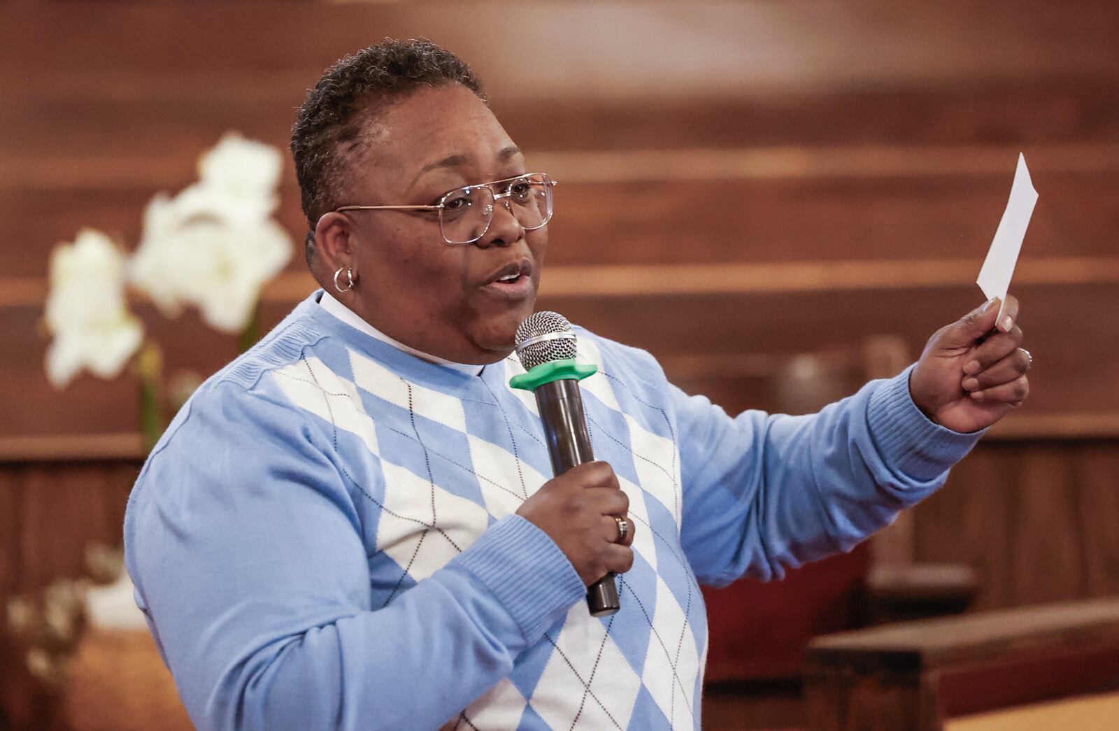 Pastor Lesley Jones speaks during a community safety meeting "Be a Neighbor: Building a Better Springfield for All" hosted by the Amos Project on Thursday, Jan. 29, 2026, at Zion Hill Baptist Church. Organizers gathered to give tools and guidance with expected ICE activity after the Temporary Protected Status expires on Tuesday, Feb. 3, 2026. JOSEPH COOKE/STAFF