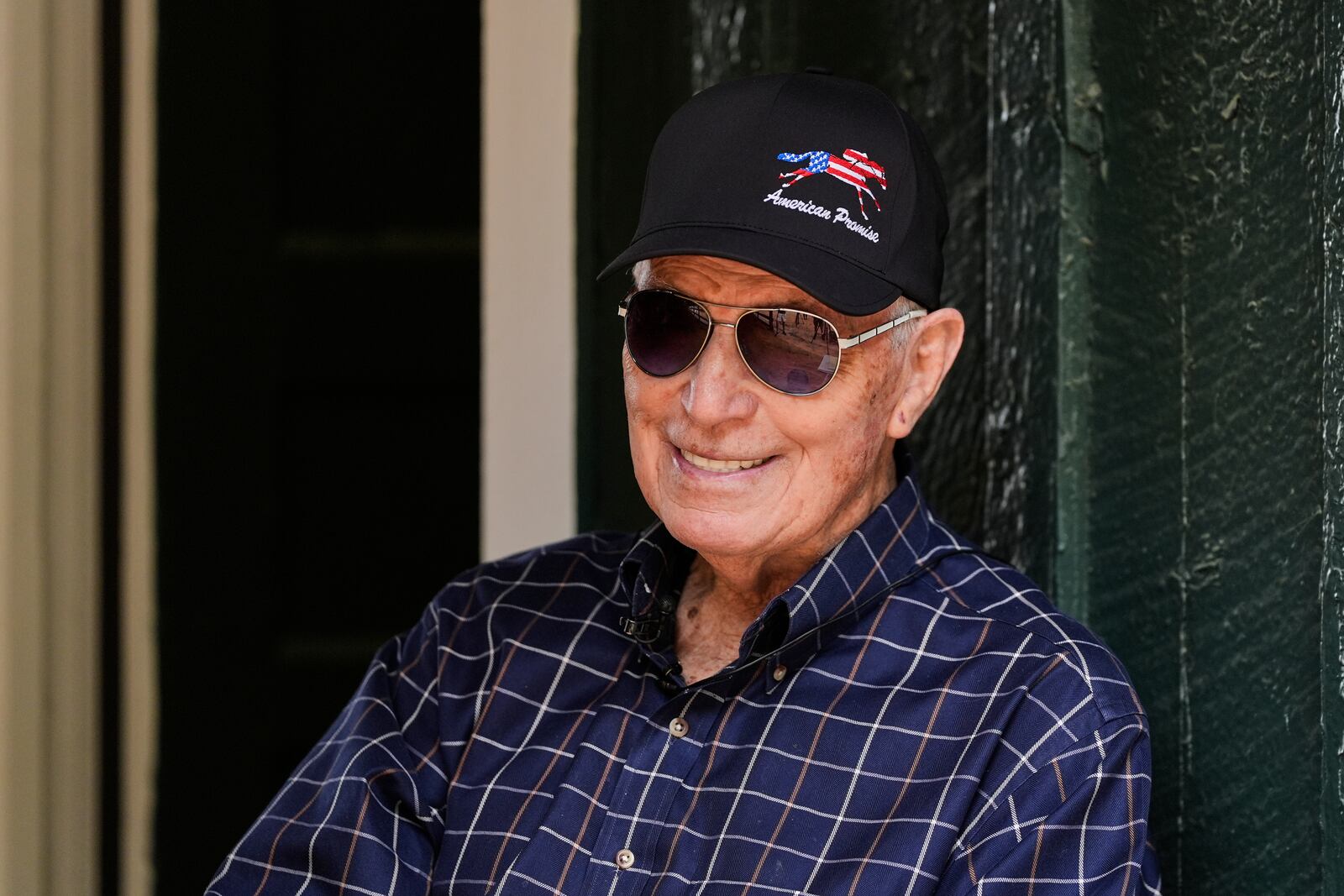 FILE - Trainer D. Wayne Lukas talks to media after arriving at Pimlico Race Course in Baltimore, with Preakness Stakes entrant American Promise, May 12, 2025. (AP Photo/Stephanie Scarbrough, File)