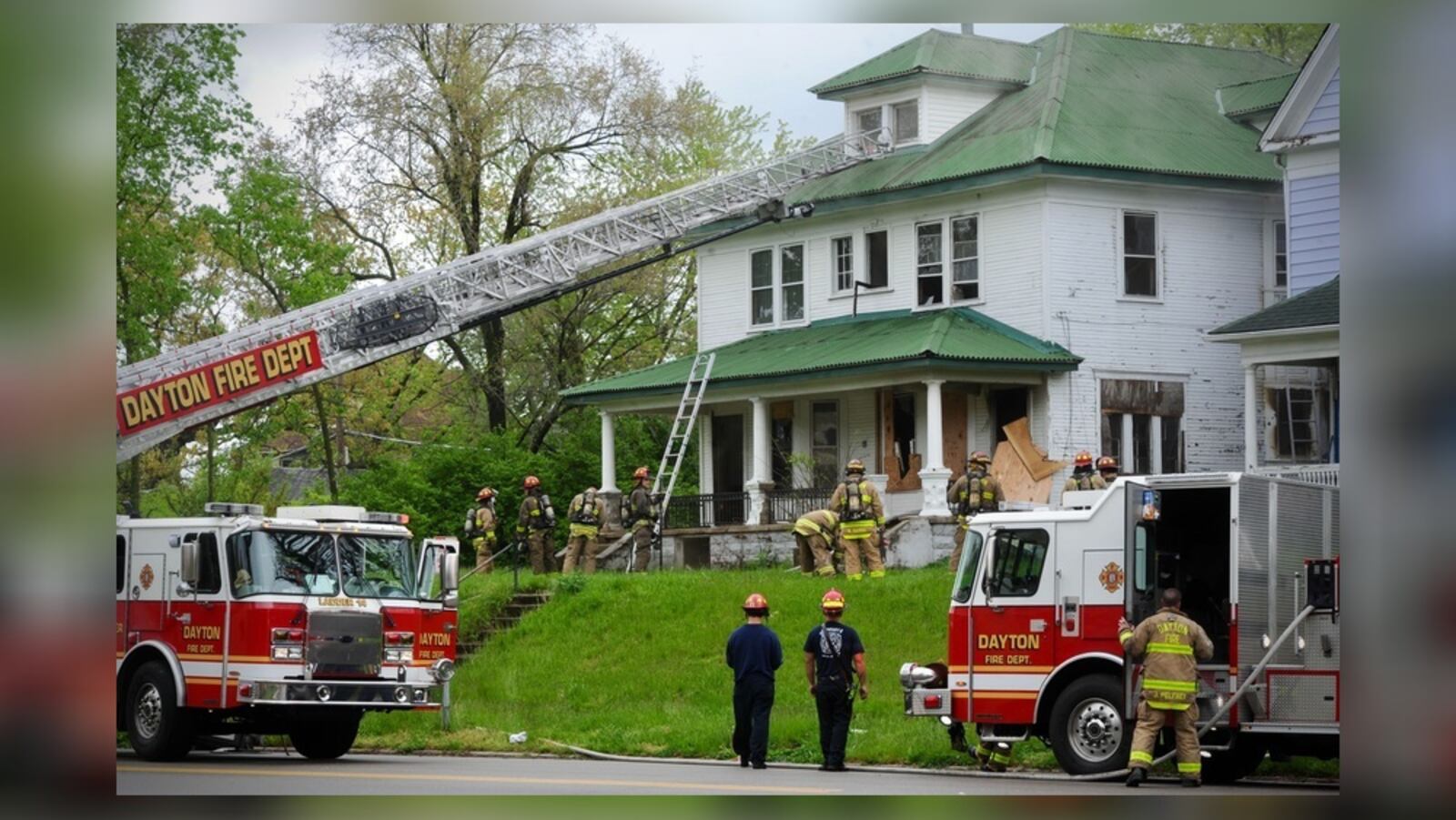 Firefighters were called to a fire at a boarded up house in the 500 block of Forest Avenue in Dayton's Five Oaks neighborhood on Thursday, April 29, 2021. MARSHALL GORBY/STAFF
