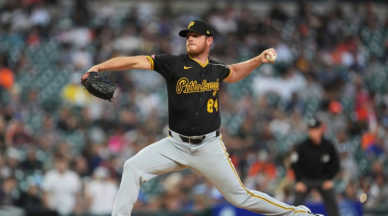 Pittsburgh Pirates pitcher Caleb Ferguson throws against the Detroit Tigers in the eighth inning during the second baseball game of a doubleheader, Thursday, June 19, 2025, in Detroit. (AP Photo/Paul Sancya)