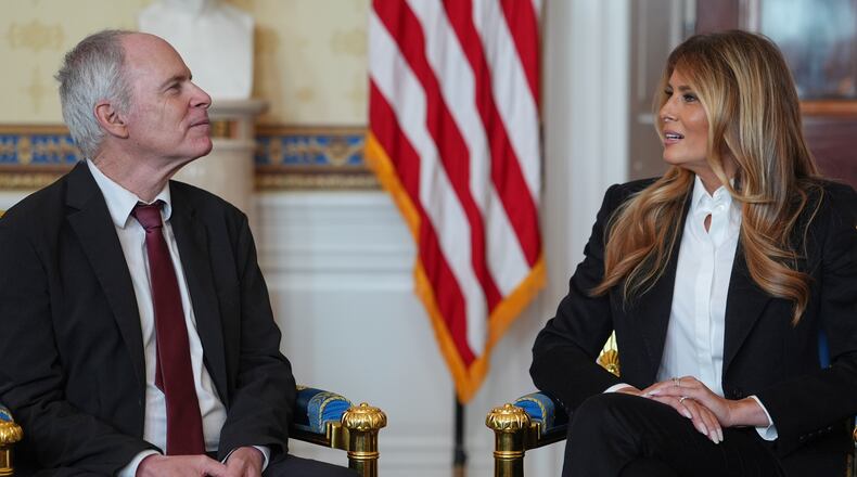 First lady Melania Trump meets with freed American-Israeli hostage Keith Siegel at the White House, Wednesday, Feb. 4, 2026, in Washington. (AP Photo/Evan Vucci)