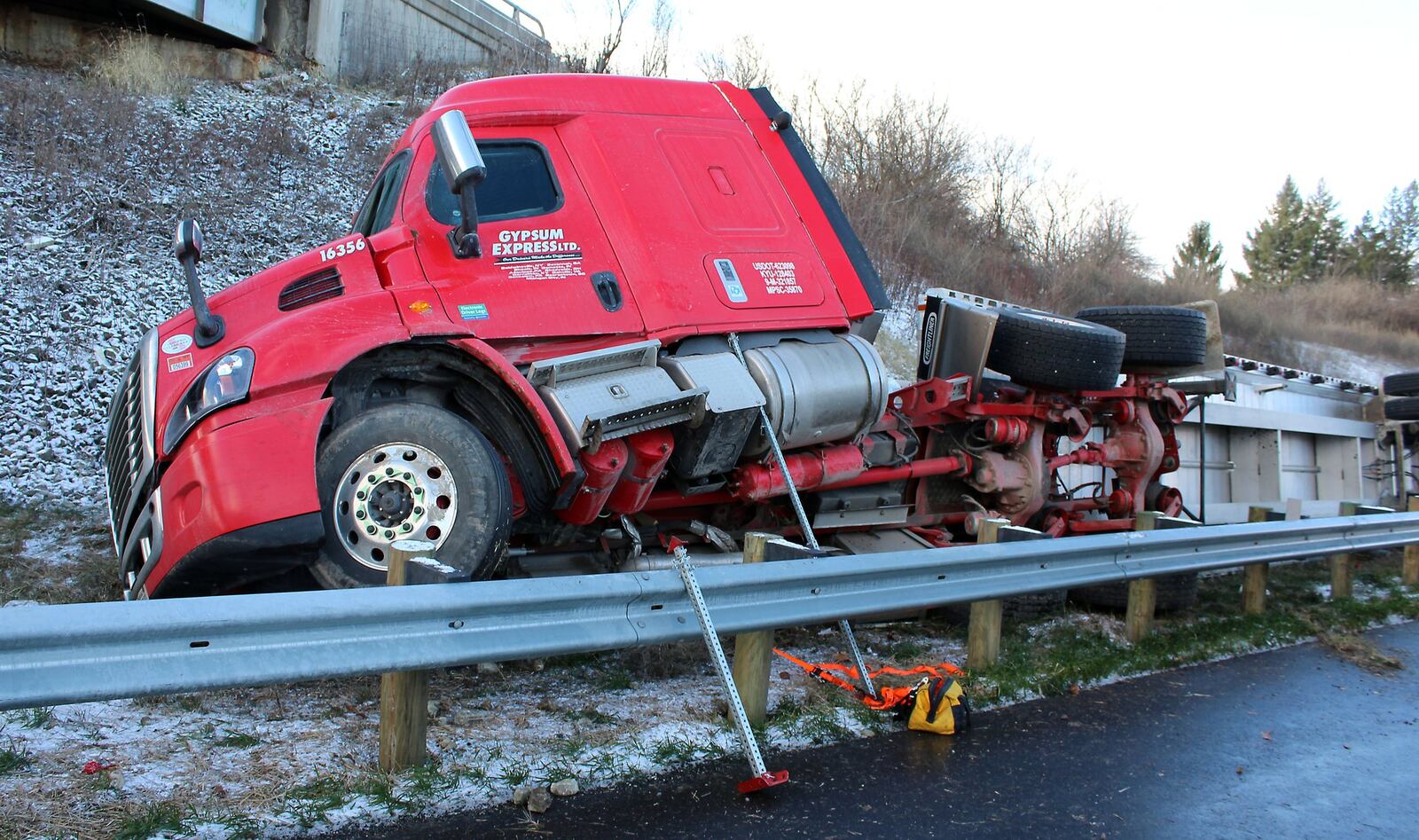 A semi-truck carrying dry wall crashed and landed on it’s side on Interstate 70 in Clark County. The driver was transported to Springfield Regional Medical Center with non life threatening injuries. JEFF GUERINI/STAFF