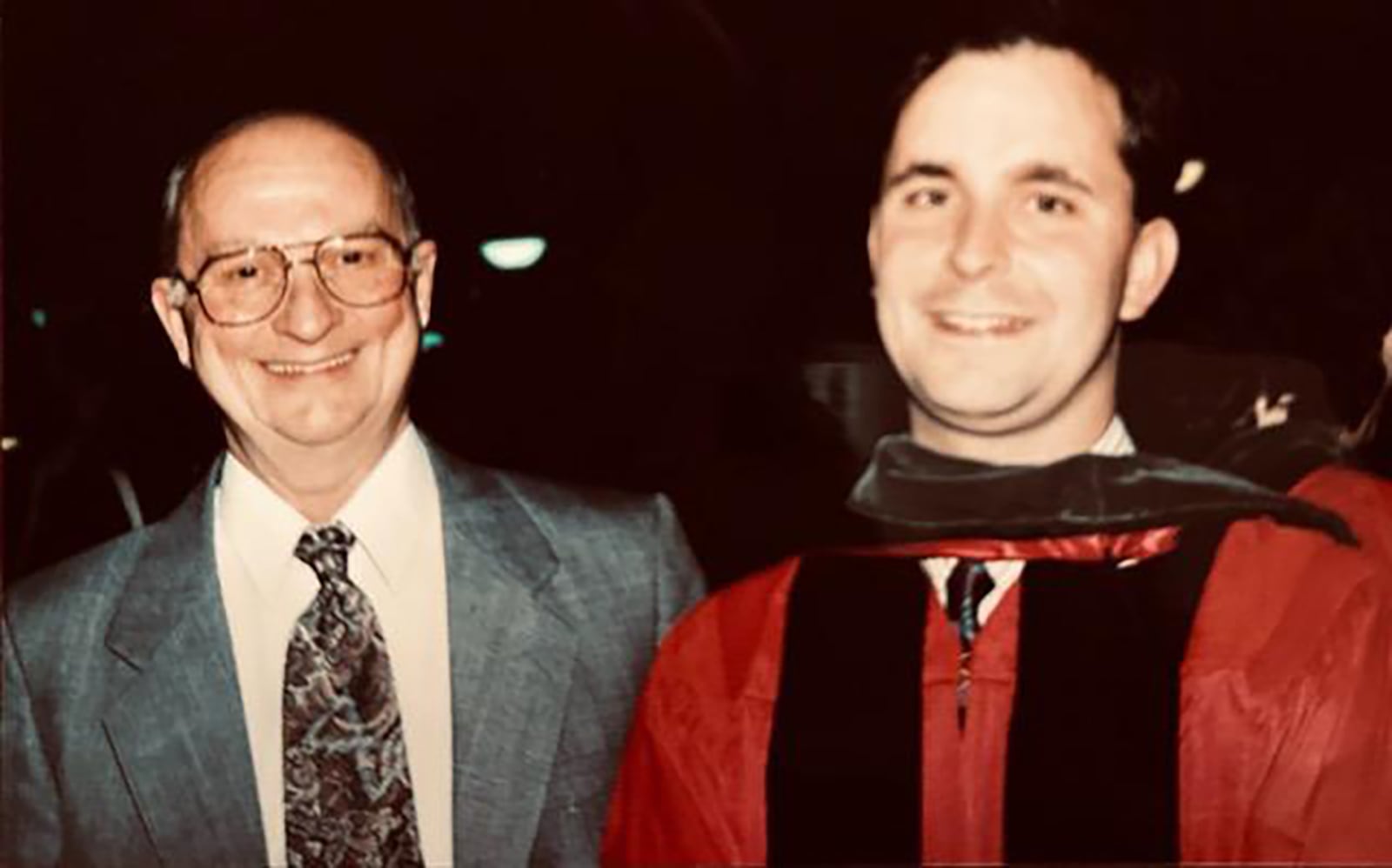 Doug Wurtzbacher (right) with his dad Roger at his graduation from the University of Cincinnati Pharmacy School in 1995. CONTRIBUTED