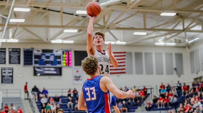 Preble Shawnee's Mason Shrout, shown here vs. Tri-Village on Tuesday, scored 28 points in the Arrows' win over Versailles on Saturday night in the Division III regional finals. Michael Cooper/CONTRIBUTED