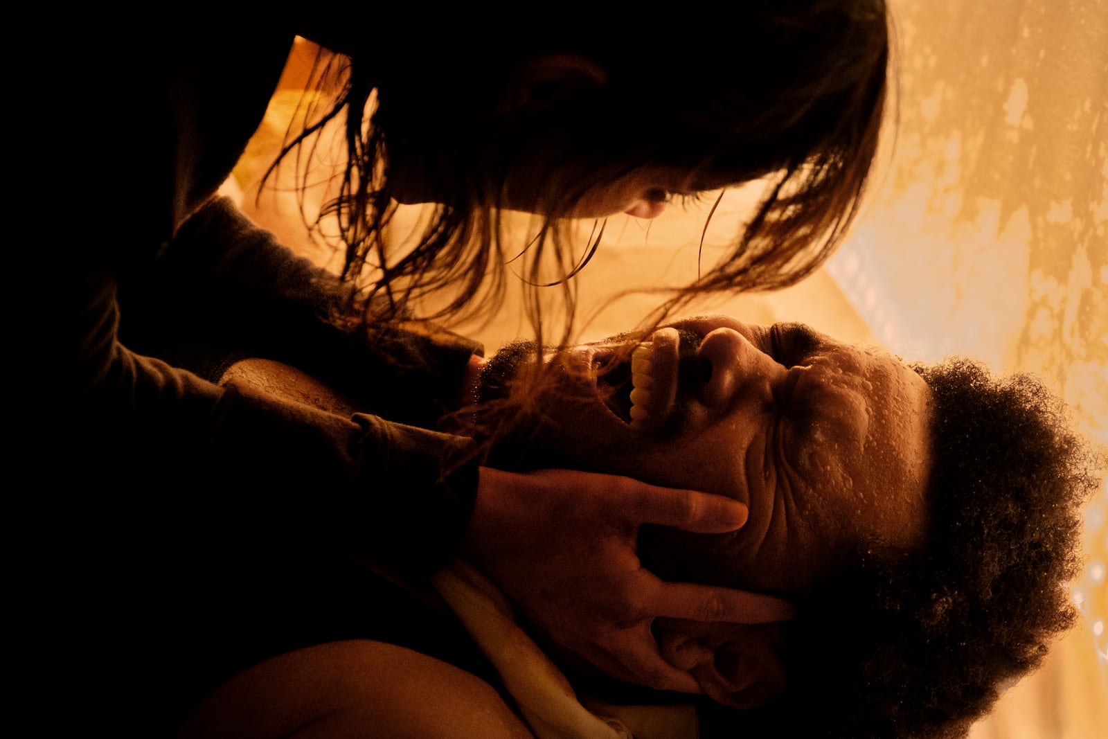 This image released by Lionsgate shows Jenna Ortega as Anima, top, and Abel "The Weeknd" Tesfaye as Abel, in a scene from "Hurry Up Tomorrow." (Andrew Cooper/Lionsgate via AP)