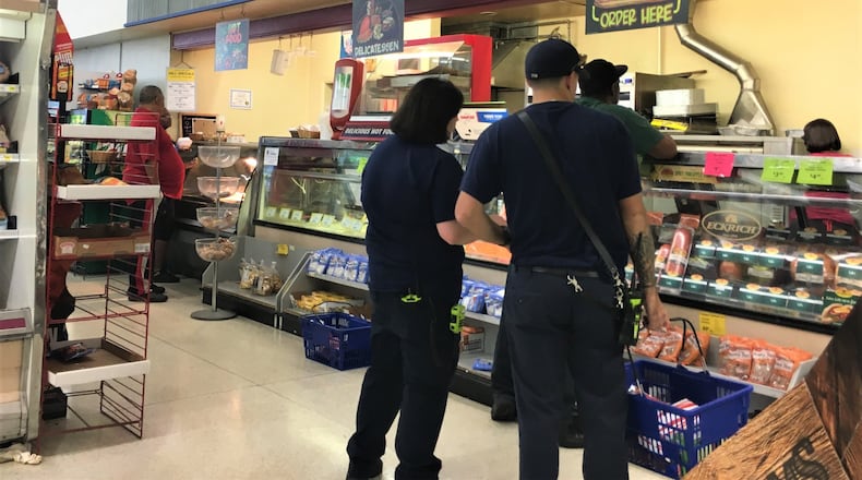 La Plaza Tapatia International Fresh Market will open in Tipp City where the previous Tipp City Food Town was located near Interstate 75. In this file photo, people wait in line at the former store.