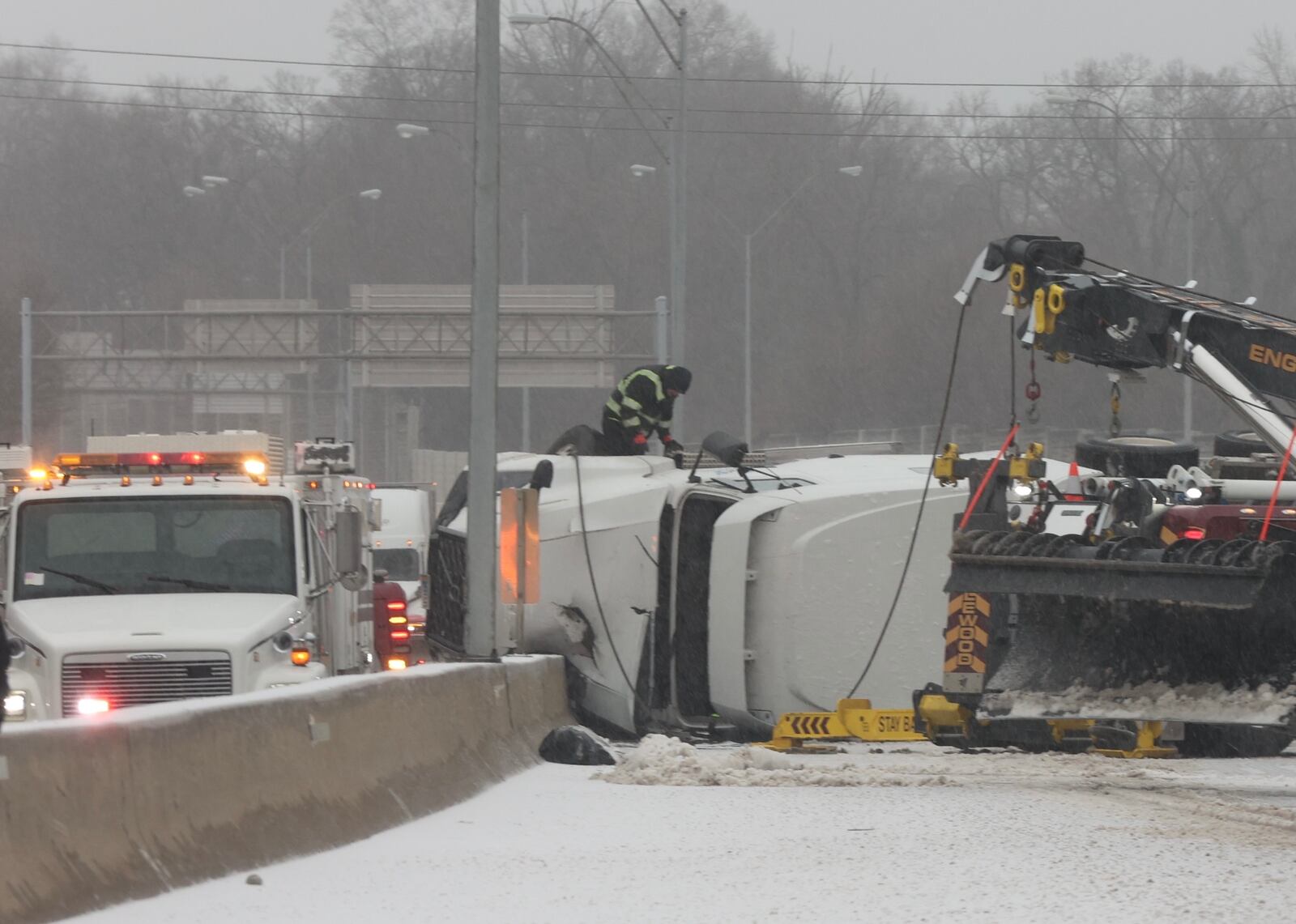 Southbound I-75 was closed after a semi-truck flipped onto its side Thursday morning.