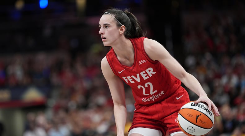 Indiana Fever's Caitlin Clark dribbles during the second half of a WNBA basketball game against the Atlanta Dream, Friday, July 11, 2025, in Indianapolis. Clark's journey will be spotlighted in the Jewish Community Center of Greater Dayton's Cultural Arts and Book Series Jan. 25, 2026. (AP Photo/AJ Mast)
