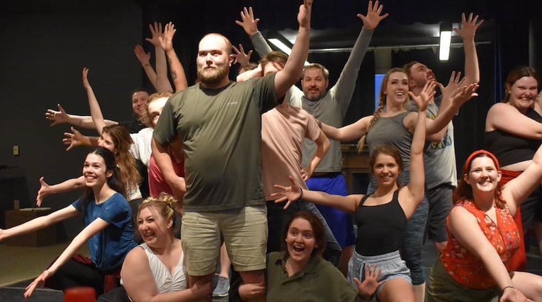 Zach King (center as Nick Bottom) and the cast of TheatreLab Dayton's production of "Something Rotten!" in rehearsal. CONTRIBUTED