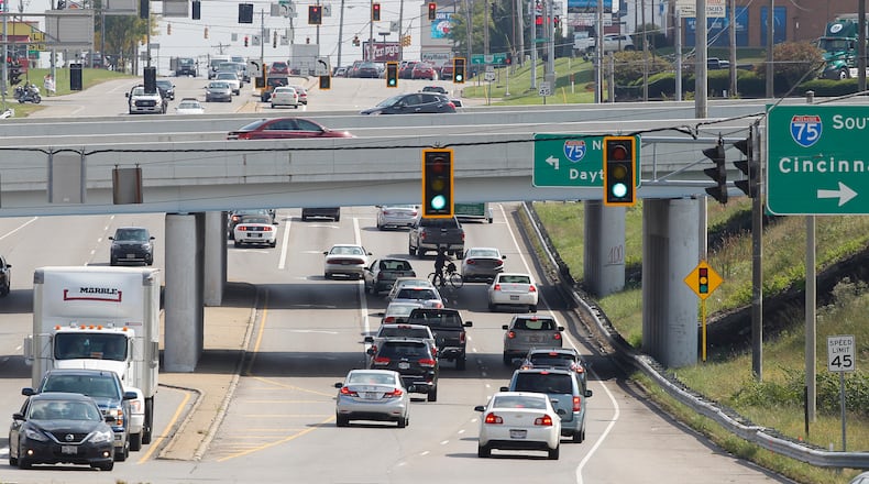 A new traffic lane design for the State Route 725 and I-75 interchange has been revealed by ODOT that could improve safety and allow for easier pedestrian and bicycle traffic in one of the busiest areas of the county. This view is looking east on SR 725 with the I-75 bridge. TY GREENLEES / STAFF