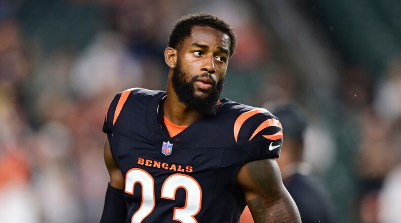FILE - Cincinnati Bengals cornerback Dax Hill (23) warms up before an NFL football game against the Washington Commanders on Monday, Sept. 23, 2024, in Cincinnati. (AP Photo/Emilee Chinn, File)