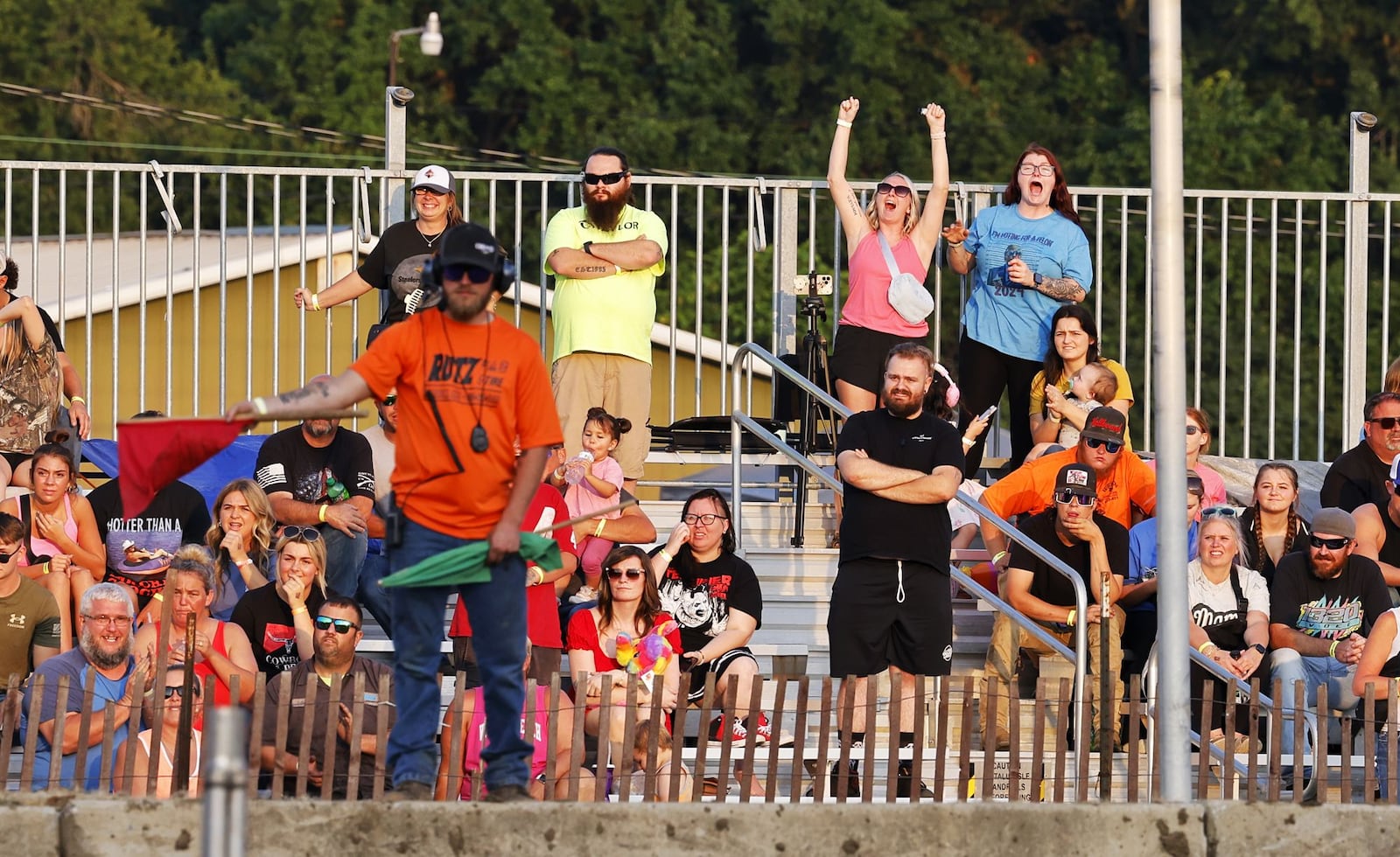 Spectators watch the demolition derby at the Butler County Fair  Thursday, July 25, 2024 in Hamilton. NICK GRAHAM/STAFF