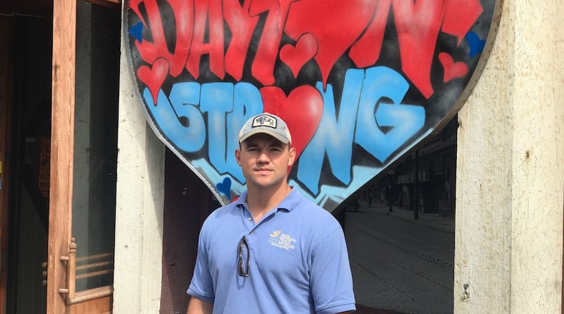 Alter grad and former San Francisco 49er Chris Borland in front of of Ned Pepper’s Bar in the Oregon District. Tom Archdeacon/CONTRIBUTED