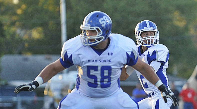 Miamisburg offensive lineman Josh Myers (58) protects QB Tyler Goertermiller. Wayne hosted Miamisburg in a high school football game on Friday, Sept. 26, 2014. MARC PENDLETON / STAFF