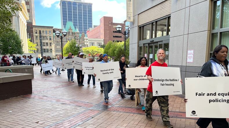 Participants in Sunday's Dayton Declare prayer march began their 1.5-mile trek to Levitt Pavilion from Courthouse Square. THOMAS GNAU/STAFF