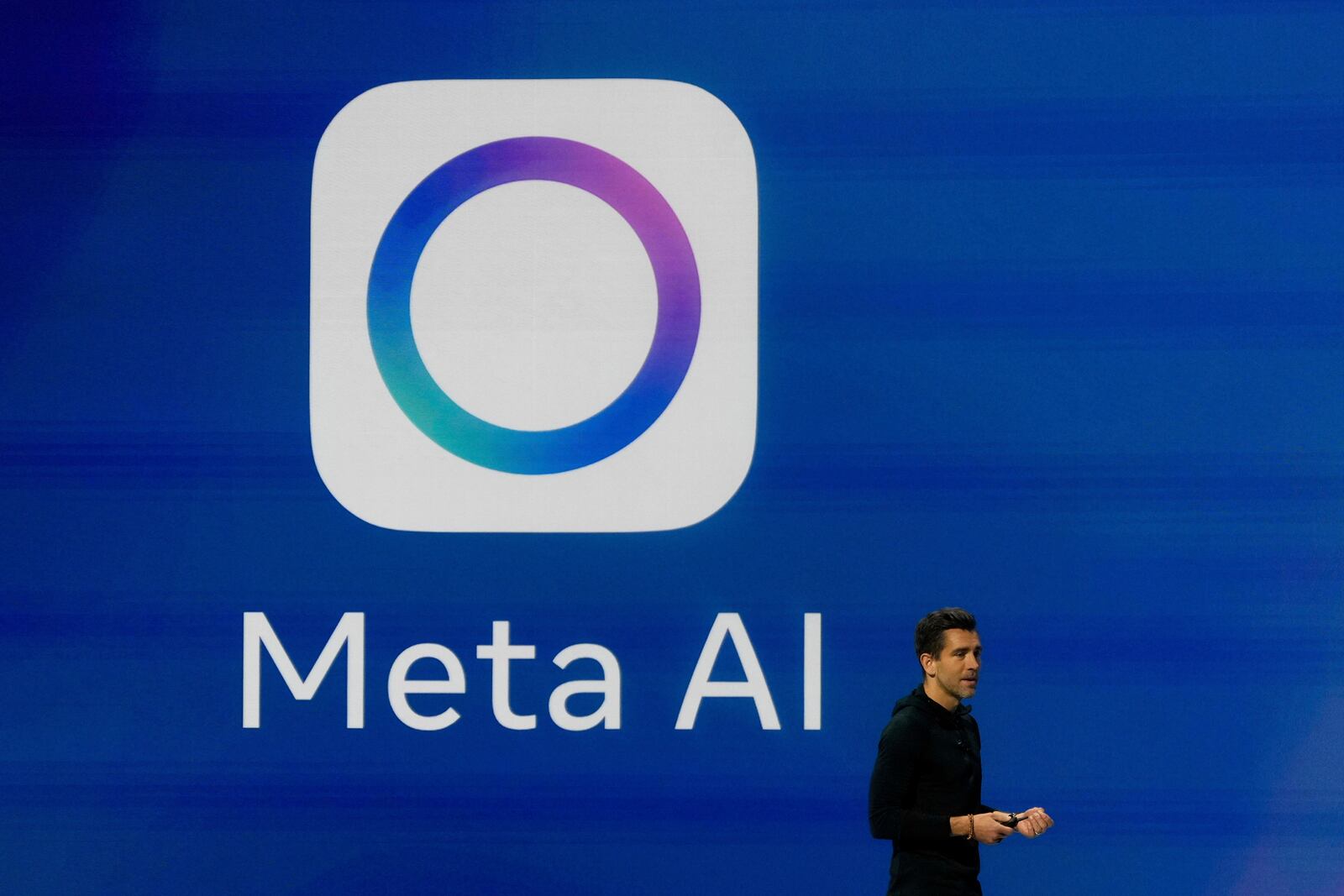 FILE - Meta Chief Product Officer Chris Cox speaks at LlamaCon 2025, an AI developer conference, in Menlo Park, Calif., April 29, 2025. (AP Photo/Jeff Chiu, File)