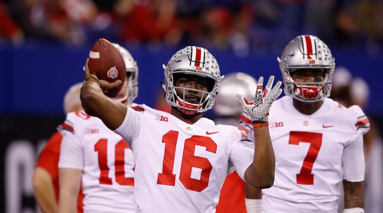 INDIANAPOLIS, IN - DECEMBER 02:  Quarterback J.T. Barrett #16 of the Ohio State Buckeyes looks to pass while warming up before taking on the Wisconsin Badgers in the Big Ten Championship game at Lucas Oil Stadium on December 2, 2017 in Indianapolis, Indiana.  (Photo by Joe Robbins/Getty Images)