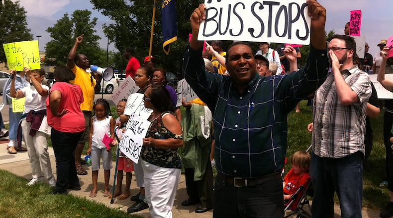 The city of Beavercreek discriminated against blacks when it denied an application by public transit to install bus stops near the mall, the Federal Highway Administration’s Office of Civil Rights decided. Riders showed their support of the Greater Dayton RTA in this 2013 protest. ANDREW MCGINN/FILE