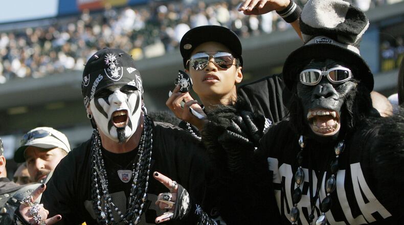 Oakland Raiders fans in Black Hole during game against the Pittsburgh Steelers at McAfee Coliseum in Oakland, California on October 29, 2006. The Raiders won 20 to 13. (Photo by Robert B. Stanton/NFLPhotoLibrary)