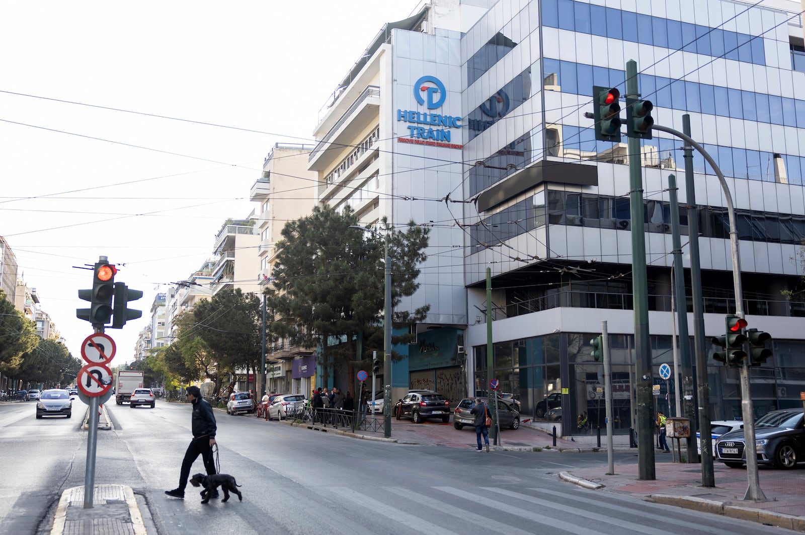 The logo of Hellenic Train, Greece's main railway company, is seen outside company's headquarters, following a bomb explosion Friday night causing causing limited damage but no injuries, in Athens, Greece, on Saturday, April 12, 2025. (AP Photo/Yorgos Karahalis)