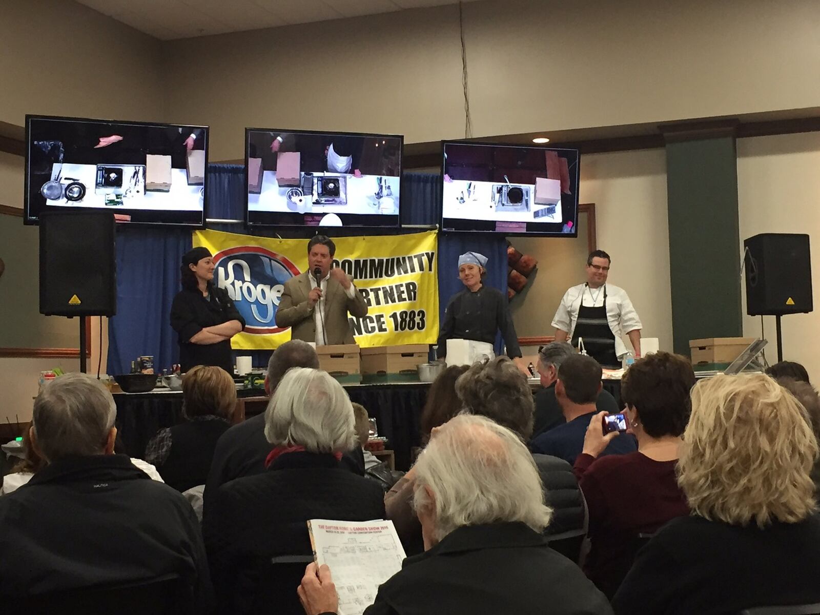 The chefs at the start of the event- l to r - chef Mariah Gahagan, emcee Jim Bucher, Chef Candace Rinke and Chef Matt Hayden. CONTRIBUTED