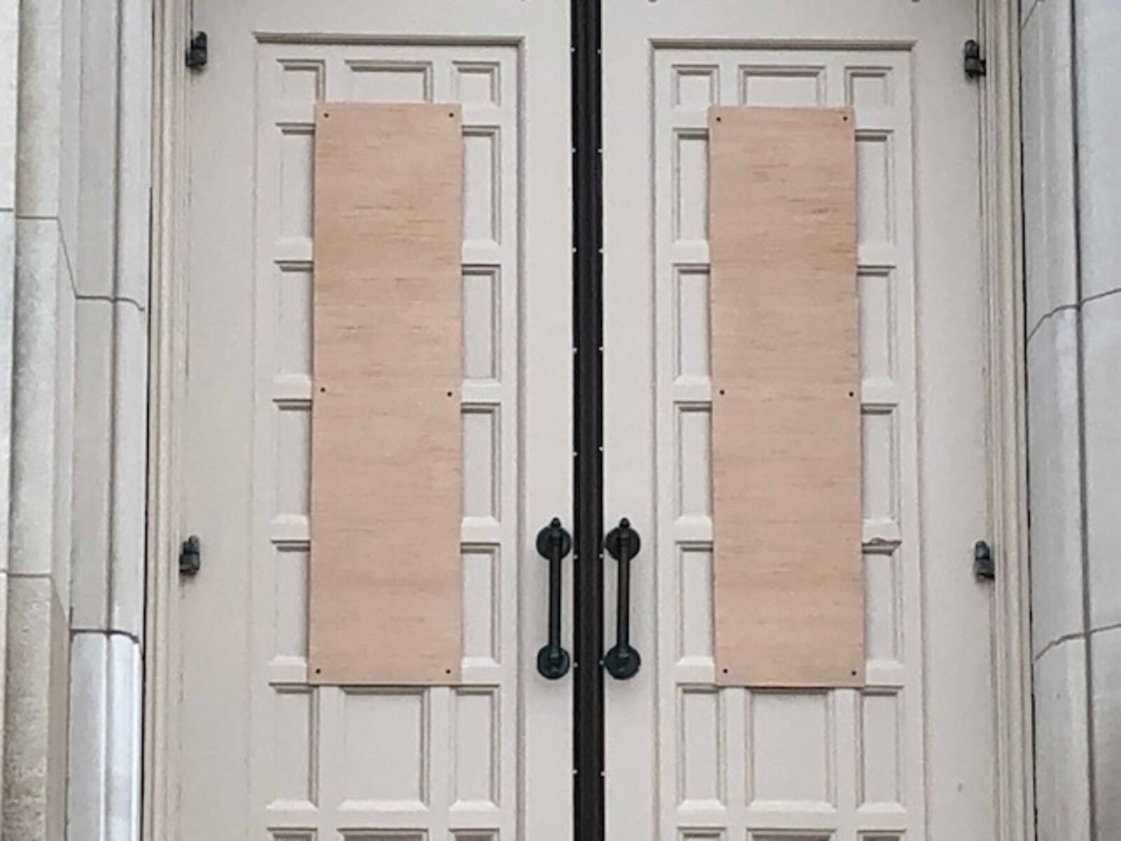 Eleven panes of stained glass windows were damaged at St. Anthony of Padua church, according to a Dayton police report. STAFF PHOTO
