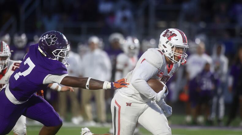Wayne's Isaiah Thompson runs for a touchdown in the second quarter against Pickerington Central on Friday, Aug. 29, 2025, in Pickerington. David Jablonski/Staff