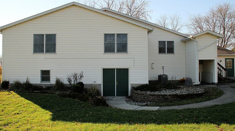 The house has 4 to 5 bedrooms, 3 full bathrooms and an eat-in kitchen.
