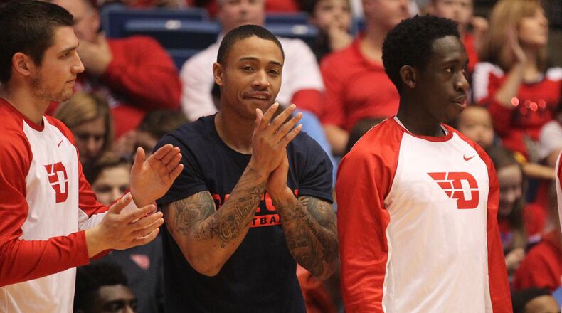 Dayton's Kyle Davis cheers from the bench on Jan. 22, 2017.