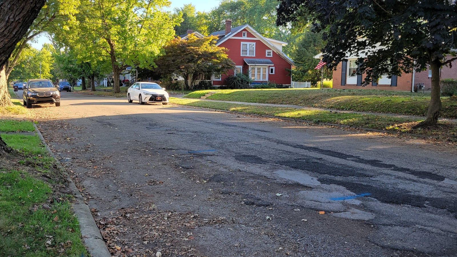 A section of road along King Street in Xenia has been patched many times over the years, to the point residents say they avoid driving over it. Xenia voters will consider a levy this fall intended to fix streets like this one. LONDON BISHOP/STAFF