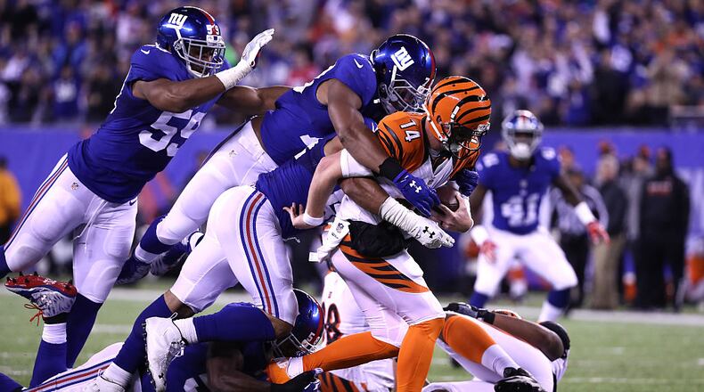 EAST RUTHERFORD, NJ - NOVEMBER 14: Jonathan Casillas #52 of the New York Giants sacks Andy Dalton #14 of the Cincinnati Bengals during the fourth quarter of the game at MetLife Stadium on November 14, 2016 in East Rutherford, New Jersey. (Photo by Al Bello/Getty Images)