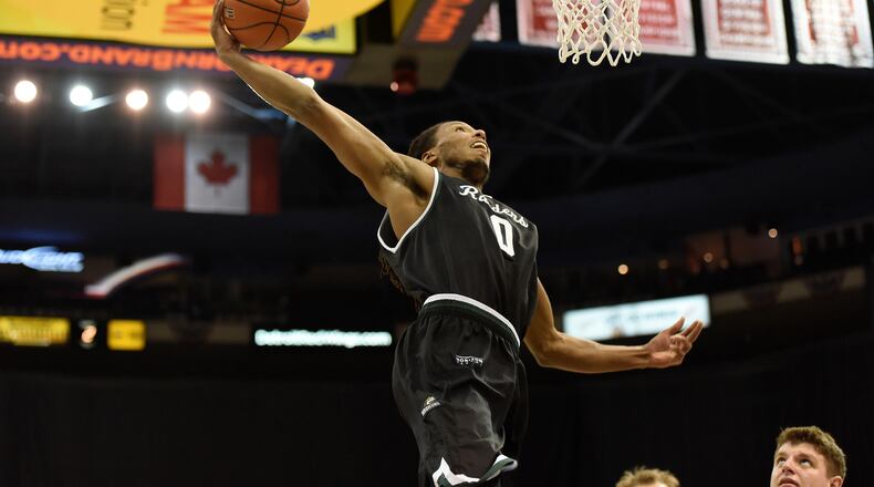 Wright State’s Steven Davis throws down a dunk during the first half of Sunday’s Horizon League tournament game vs. NKU. Contributed photo/Jose Juarez