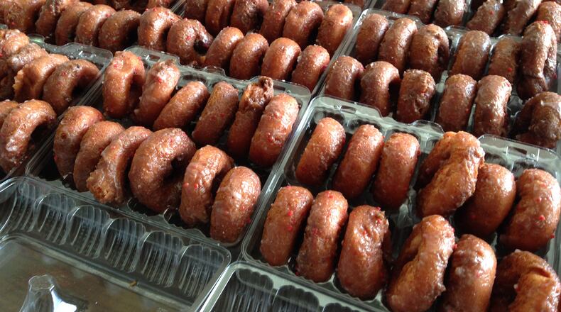 The famous strawberry donuts fund-raiser at the Troy Strawberry Festival helps benefit Troy schools music programs. (Amelia Robinson/Staff)
