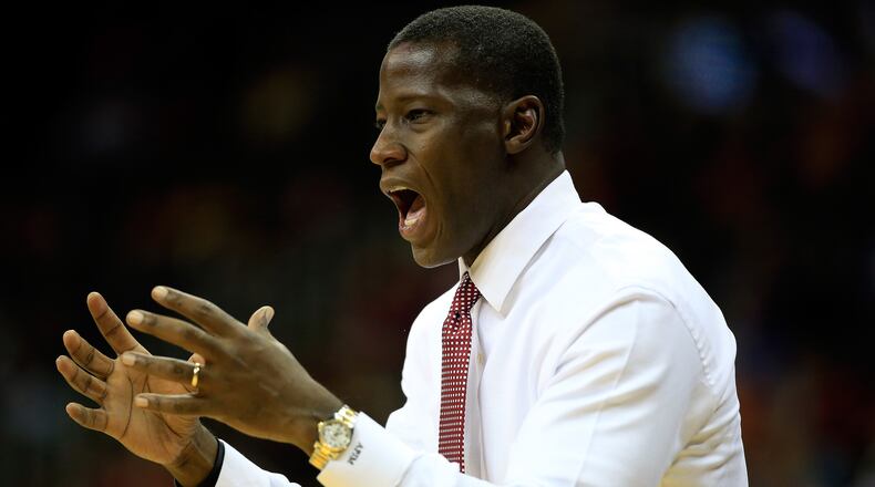 KANSAS CITY, MO - NOVEMBER 25: Head coach Anthony Grant of the Alabama Crimson Tide coaches from the bench during the CBE Hall Of Fame Classic consolation game against the Arizona State Sun Devils at Sprint Center on November 25, 2014 in Kansas City, Missouri. (Photo by Jamie Squire/Getty Images)