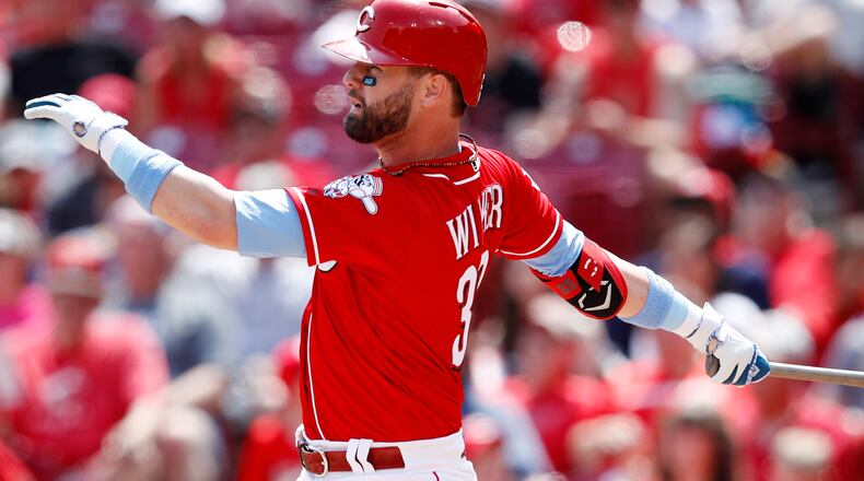 CINCINNATI, OH - JUNE 16: Jesse Winker #33 of the Cincinnati Reds hits a double to center field to drive in two runs in the second inning against the Texas Rangers at Great American Ball Park on June 16, 2019 in Cincinnati, Ohio. (Photo by Joe Robbins/Getty Images)