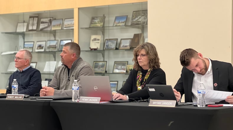 Huber Heights school board members (from left) Kelly Bledsoe and Robert Mullins, along with Treasurer Penny Rucker and Assistant Treasurer Bryan Janson. AIMEE HANCOCK/STAFF